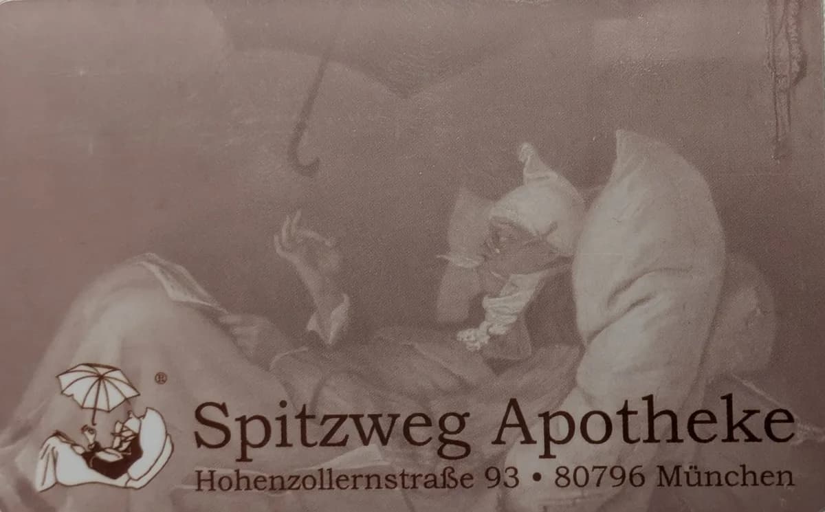 Die Kundenkarte der Spitzweg Apotheke mit Spitzwegs Motiv „Der arme Poet“.